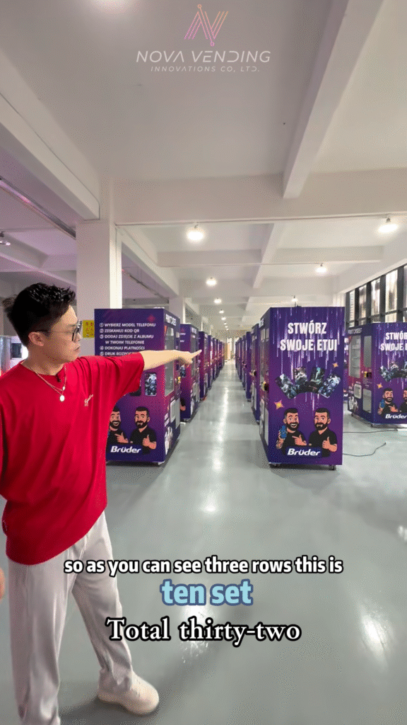 32 phone case vending machines lined up for shipment at Nova Vending factory