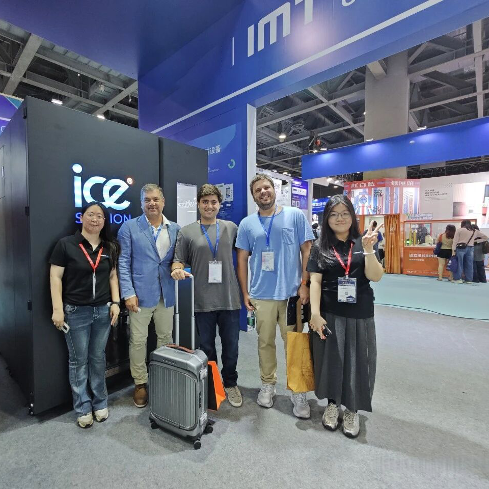 Nova Vending commercial ice vending machine with visitors at trade show